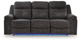 Brysonview Reclining Sofa front view with LED ambient blue light on
