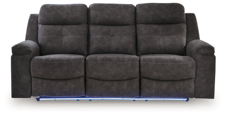 Brysonview Reclining Sofa front view with LED ambient white light on