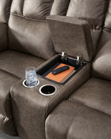 Center console detail with cup holders and storage
