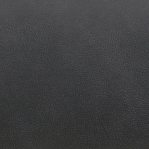 Close-up of faux leather texture and stitching on Status Check Shadow recliner