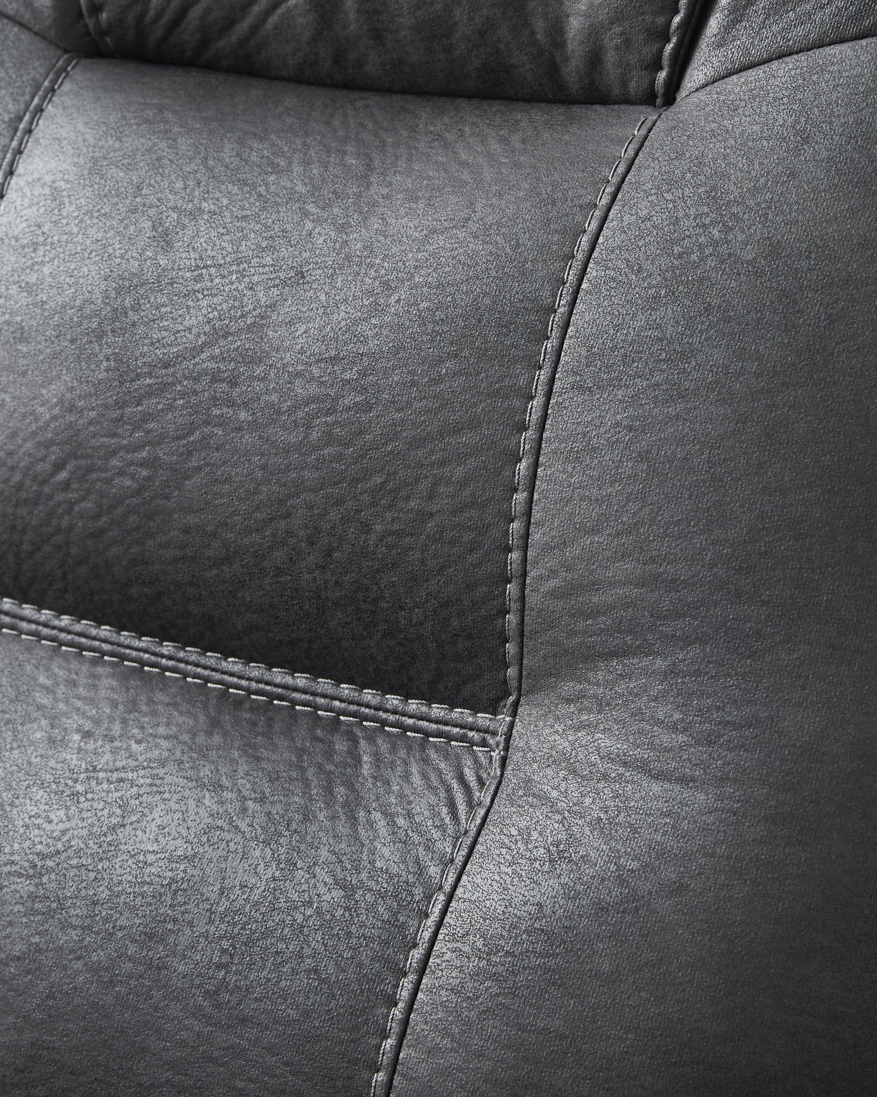 Close up of jumbo stitching on Stockworth Faux Leather Recliner