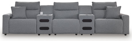 Left-arm power recliner close-up with adjustable headrest