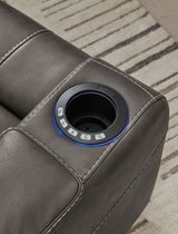 Armrest with storage and cup holder
