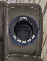 USB charging port and cup holder detail