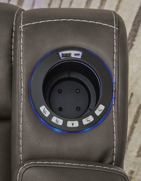 USB charging port and cup holder detail