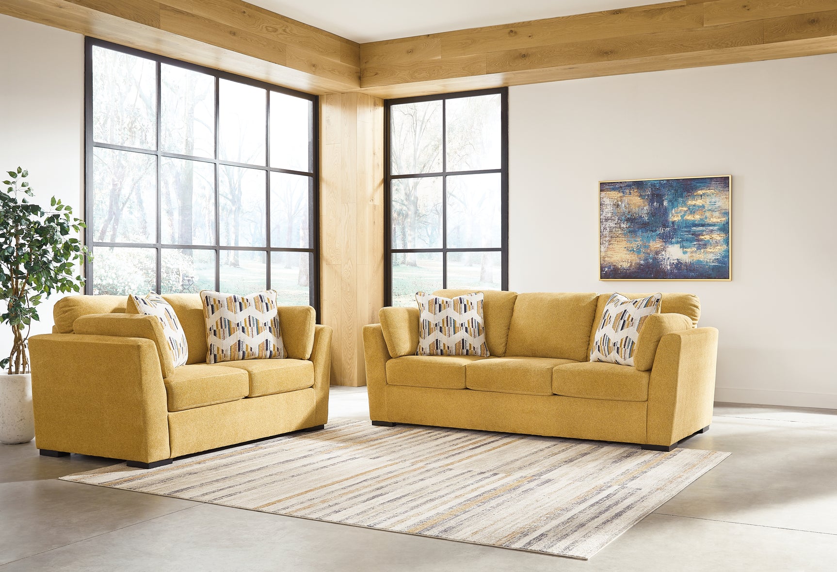 Side view of Keerwick Sunflower Sofa and Loveseat set