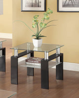 Side angle of Dyer tempered glass end table with black metal legs and shelf