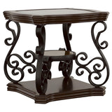 End table with dark bronze metal scrollwork legs and glass top