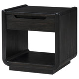 Side view of Leandro burnt black wood side table