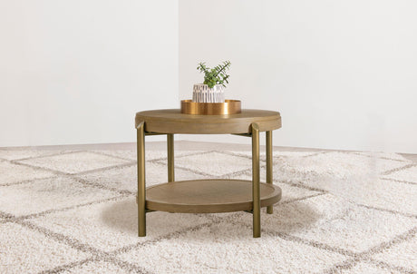 Side view of Arini Round End Side Table showcasing woven rattan shelf and metal legs