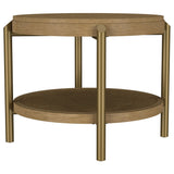 Detail of aged brass-finished metal legs on Arini Round End Table