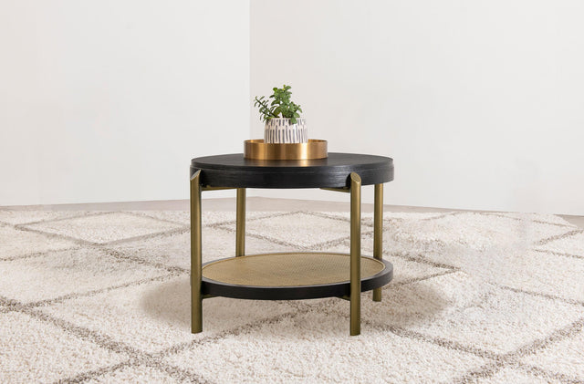 Side view of Arini round end side table with rattan lower shelf