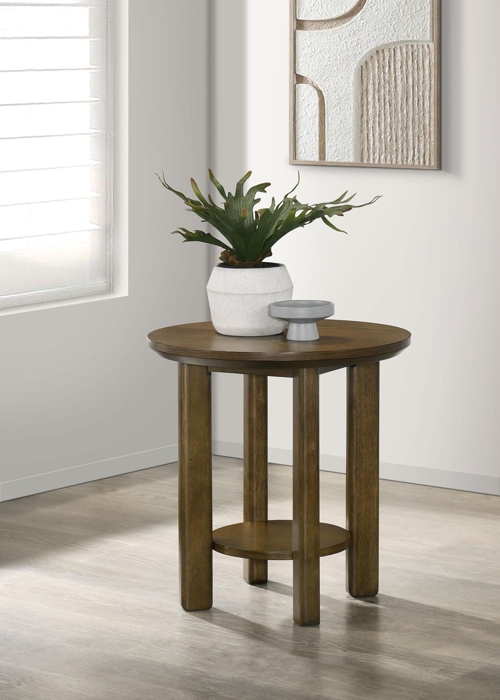 Side angle of Ottowa round brown wood side table showing leg details