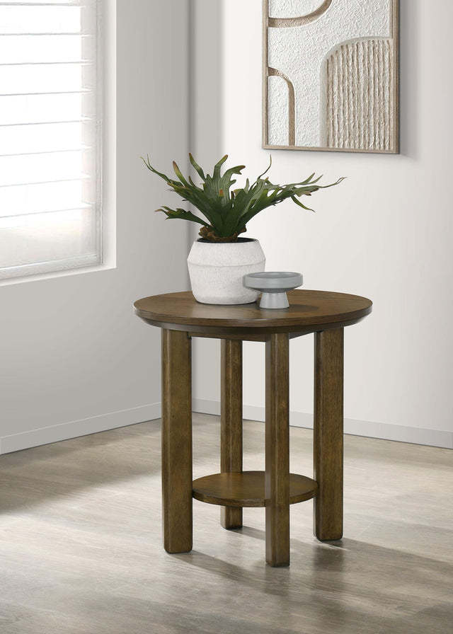 Side angle of Ottowa round brown wood side table showing leg details