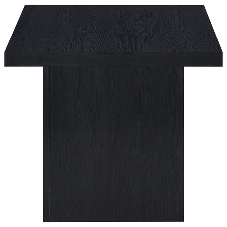 Bottom of Devar end table showing plastic glide levelers