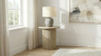 Side angle of Hamlyn Round Fluted Natural Oak Side Table highlighting fluted pedestal base