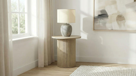 Side angle of Hamlyn Round Fluted Natural Oak Side Table highlighting fluted pedestal base