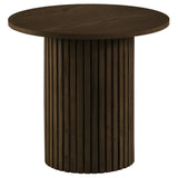 Close-up of fluted cylindrical pedestal base with vertical reeding detail