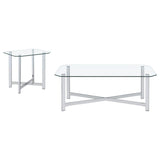 Tempered glass coffee table with chrome metal frame and cross bracing, angled side view