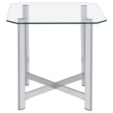 Cross braces supporting chrome frame base of coffee table