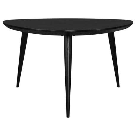 Side view of Odessa black mango wood coffee table with tapered legs
