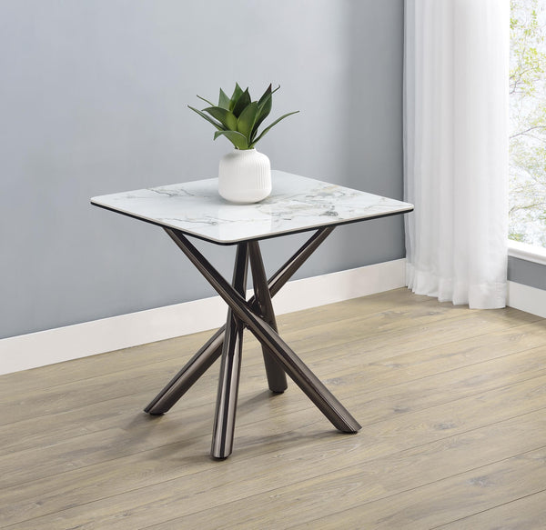 Close-up of sintered stone and black tempered glass layers on Carvell end table