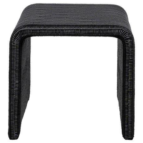 Close-up of woven black rattan surface on coffee table