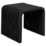 Cahya coffee table close-up showing woven rattan surface
