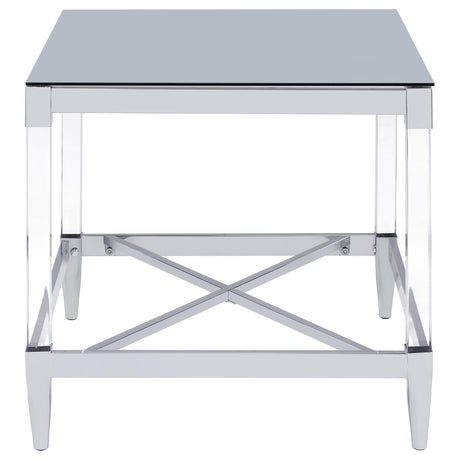 Chrome frame and clear acrylic legs detail on Lindley tables