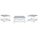 Close-up of clear acrylic leg and chrome tapered foot of Lindley end table
