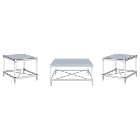 Close-up of clear acrylic leg and chrome tapered foot of Lindley end table