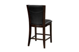 Side view showing chair design with dark brown faux leather and espresso wood frame