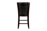 Close detail of chair upholstery stitching on dark brown faux leather
