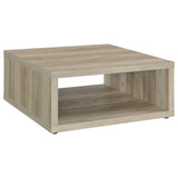 View of coffee table lower shelf with decor items