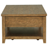 Wide lower shelf holding storage baskets under Payne table