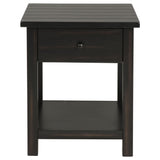 Drawer pulled out from end table showing storage space