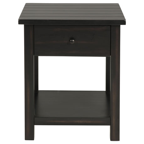 Drawer pulled out from end table showing storage space