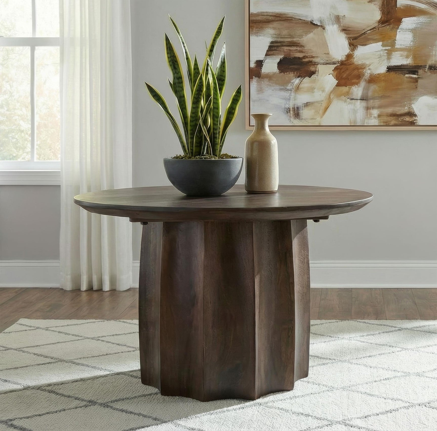 Cayenne solid mango wood round coffee table in walnut finish - side angle