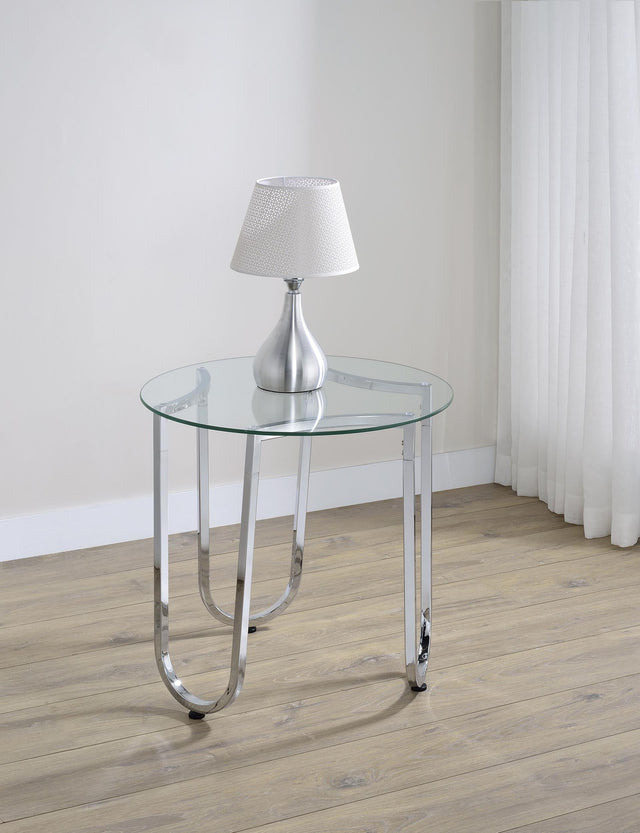 Side view of Beller round chrome side table