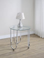 Side view of Beller round chrome side table