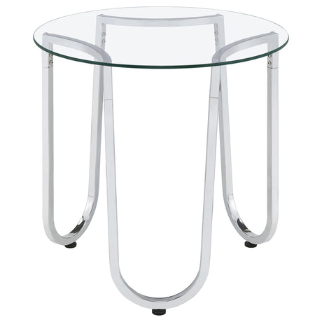Beller side table next to sofa with decor items
