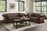 Front view of Tiverton brown faux leather tufted sofa and loveseat set