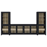 Media tower unit of Denison 3-piece entertainment center showing adjustable shelves