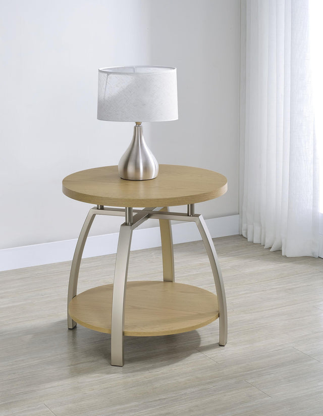 Side view showing curved electroplated metal legs of Dacre end table