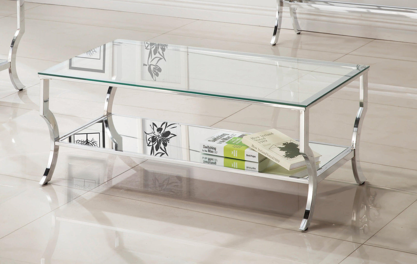 Saide rectangular coffee table side angle highlighting mirrored shelf and chrome frame
