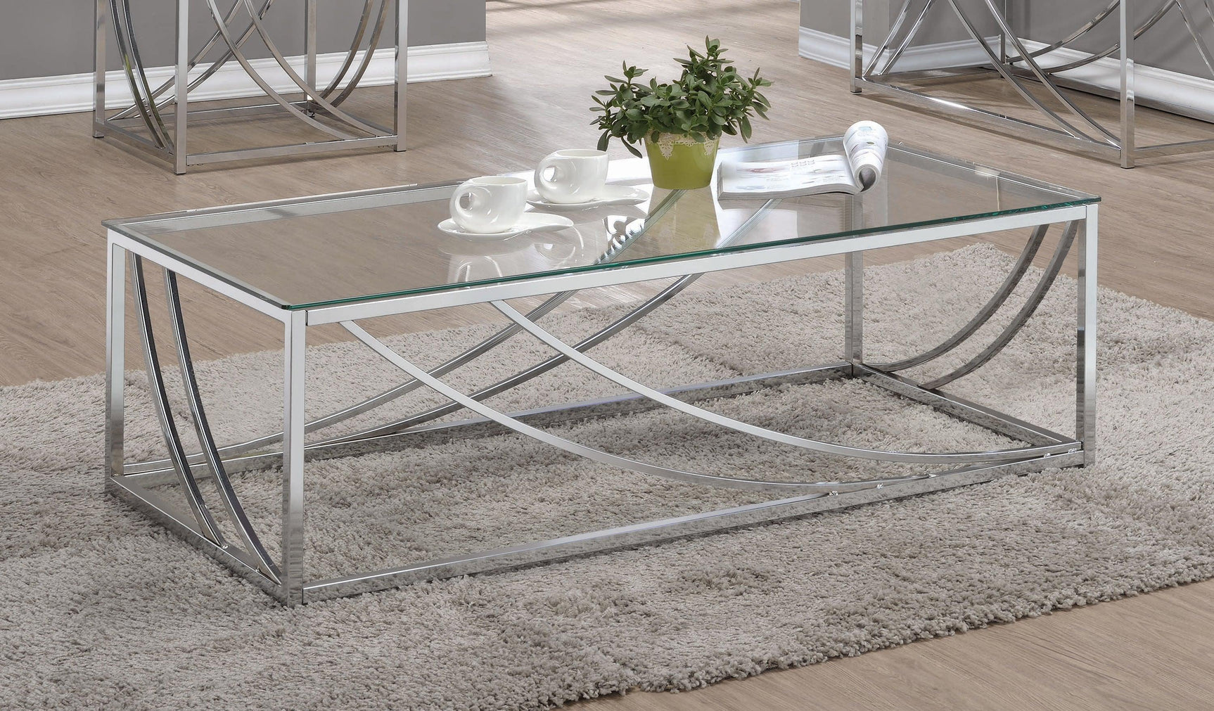 Lille Glass Top Coffee Table displaying chrome swoop accent legs