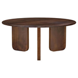 Coffee table with decorative items on top in living room setting