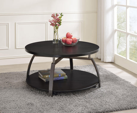 Dacre Round Coffee Table with bottom shelf, angled metal base, side angle