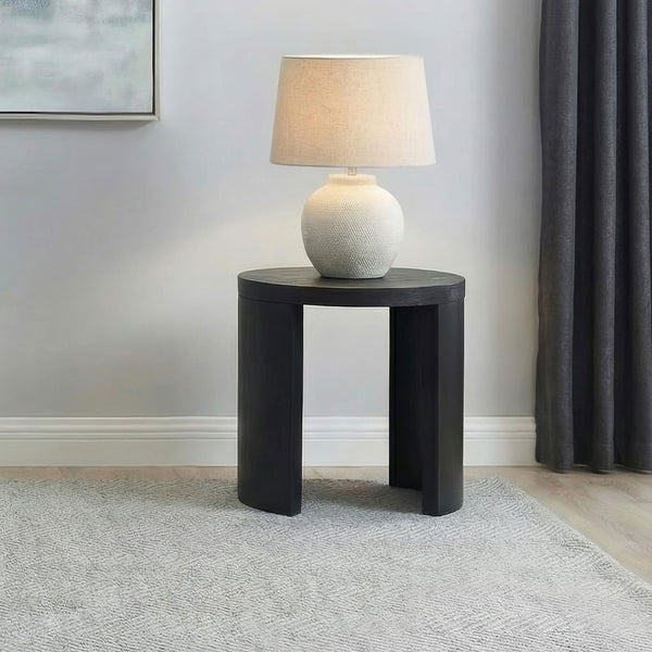 Sweeney round black wood side table top view