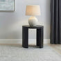 Sweeney round black wood side table top view